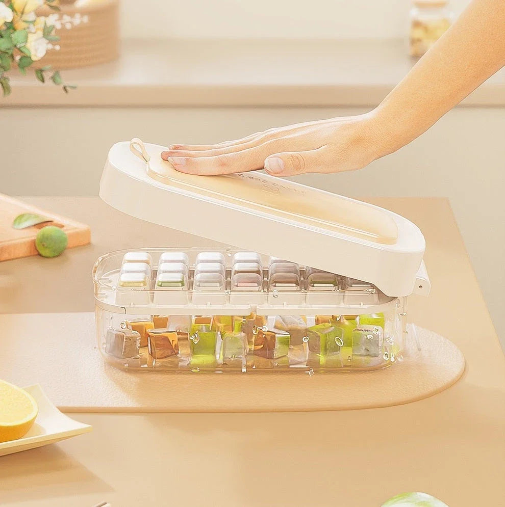 Versatile ice cube tray with high capacity, easy release, and dedicated storage compartment for included ice shovel