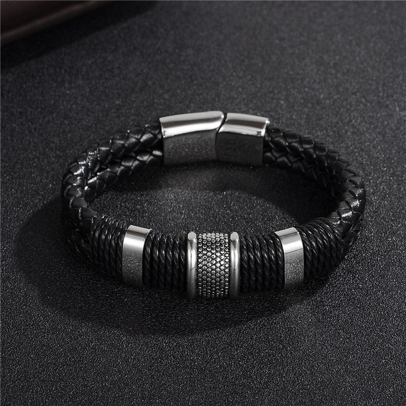 Premium black braided leather bracelet with titanium and stainless steel clasp, a timeless accessory for the modern gentleman