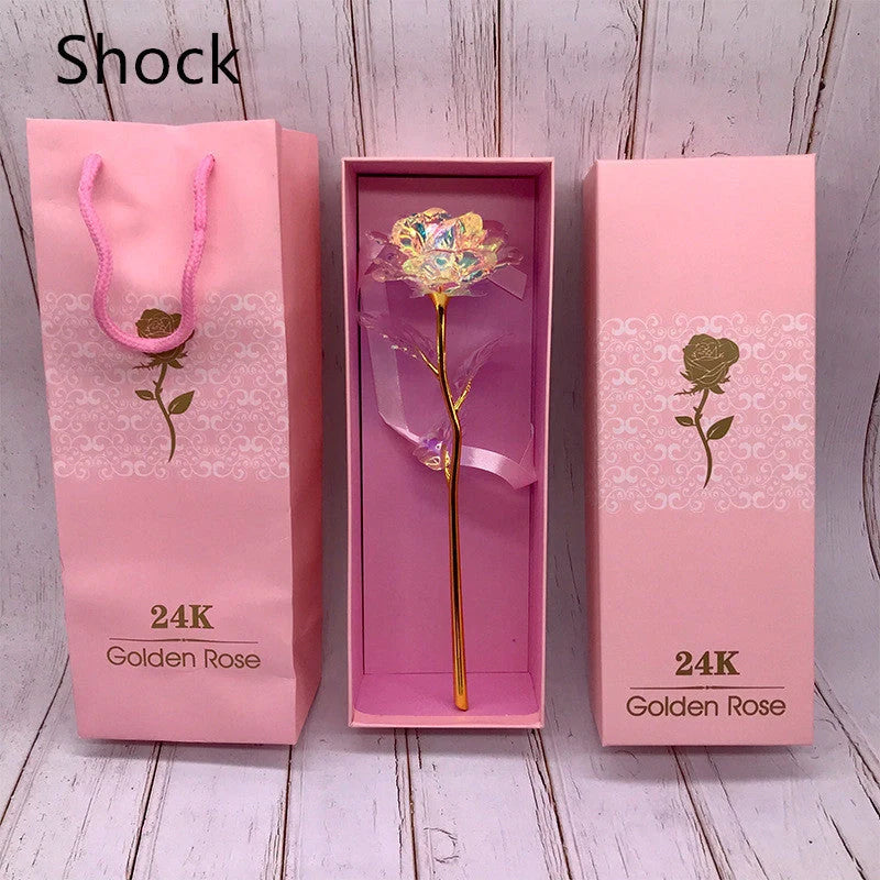 A luxurious 24K gold-plated rose flower bouquet set with a gift box and tote bag