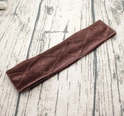 Adjustable and flexible velvet headband designed to securely hold wigs and hairpieces in place