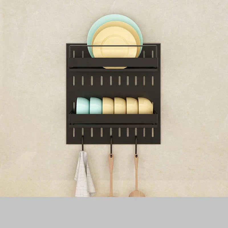 A high-quality stainless steel wall-mounted kitchen storage rack with a perforated design for customisable storage