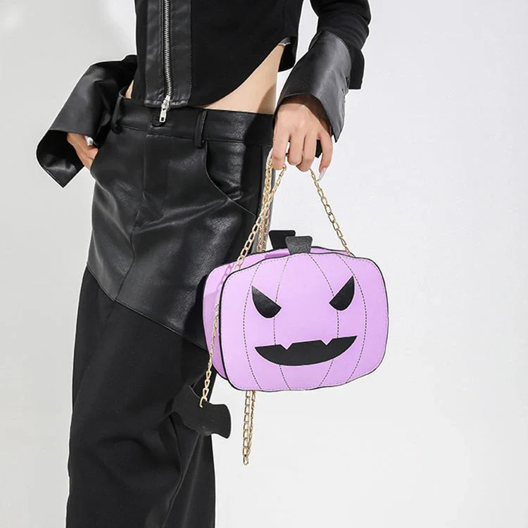 Enchanting Halloween pumpkin-themed shoulder bag in various colours, featuring an adjustable chain strap and trendy urban style