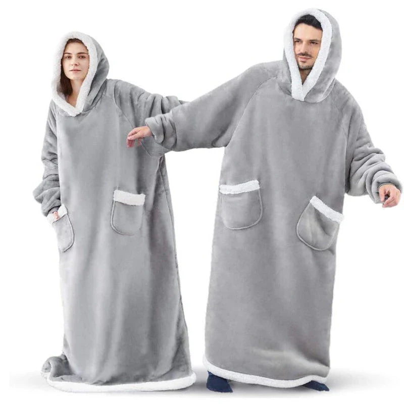 Comfy oversized TV hoodie blanket in various stylish colors, perfect for cozy movie nights and relaxation at home.