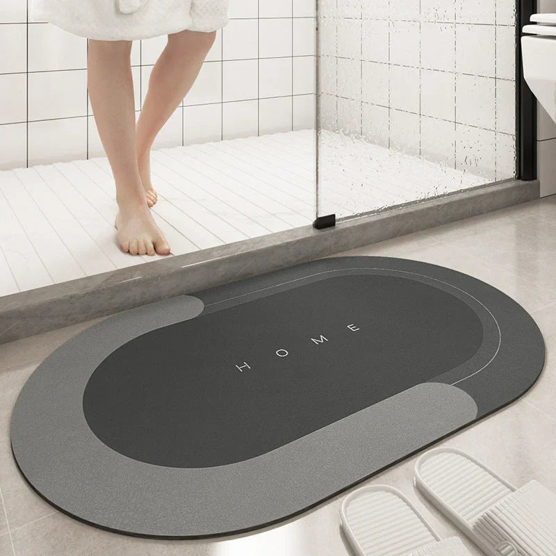 Plush, machine-woven bathroom mat with non-slip surface, available in rectangle and oval shapes in a variety of colours.