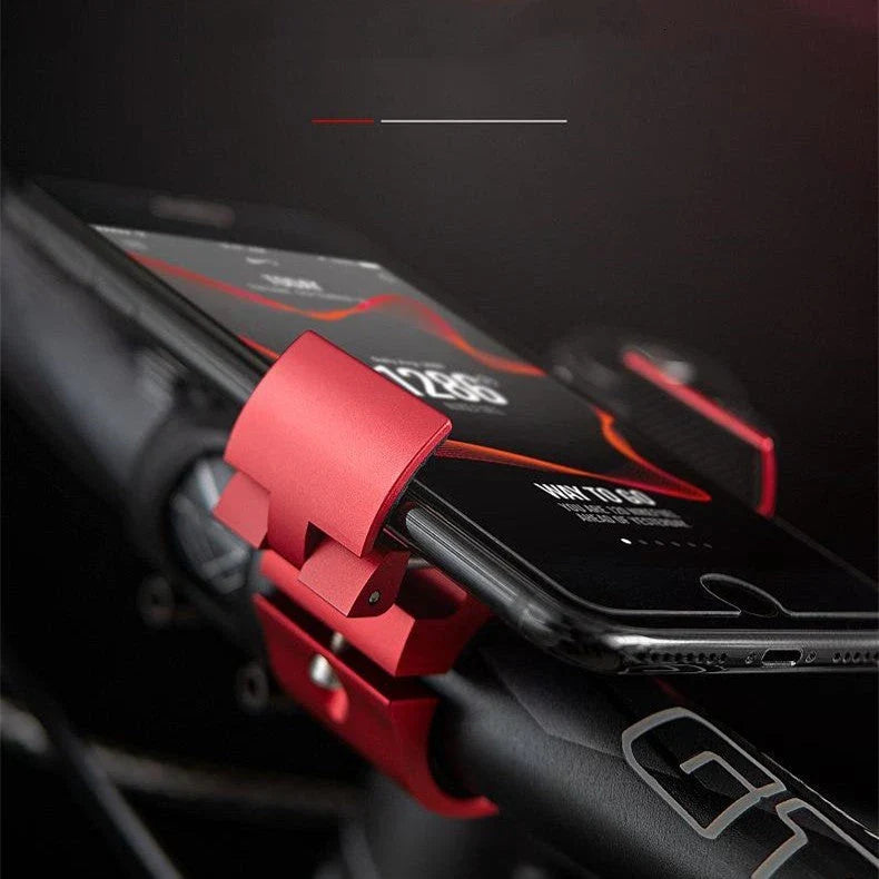 Robust folding bicycle phone holder made of aluminium alloy with shock-absorbing silicone pads for secure and hands-free cycling in the UK