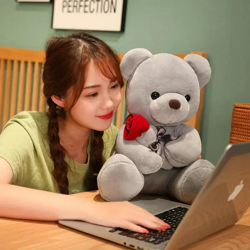 Soft and huggable teddy bear plush pillow in brown, beige, and grey colors