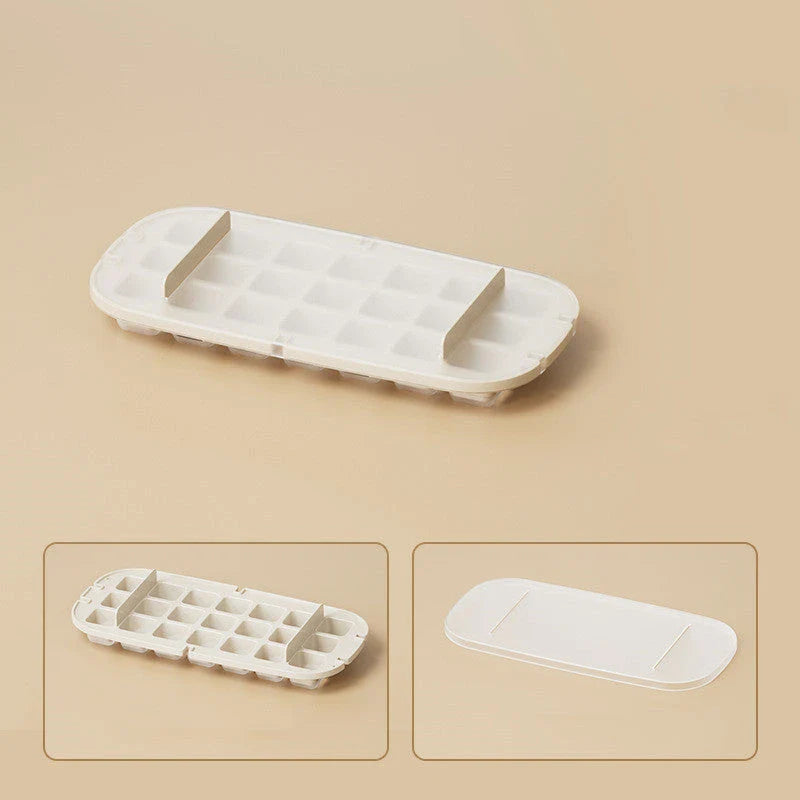 Versatile ice cube tray with high capacity, easy release, and dedicated storage compartment for included ice shovel