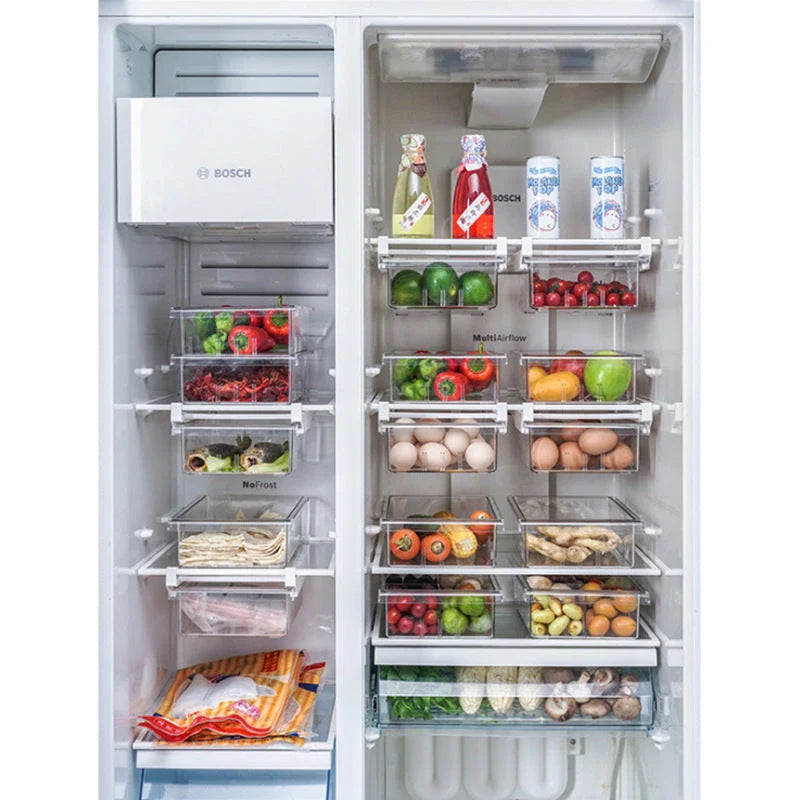 Transparent rectangular storage box with modular grid system for organised storage in kitchen or office