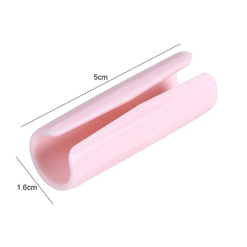 Non-slip sheet fixing clips in various colours for securing bedding and cushions