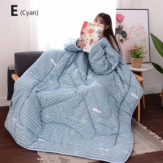 Cozy quilted lounger with sleeves in various colors and sizes, perfect for year-round indoor comfort and relaxation.