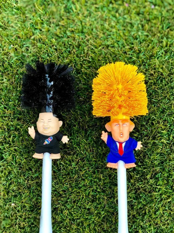 Hilarious Trump-themed toilet brush with bright yellow color and distinctive design