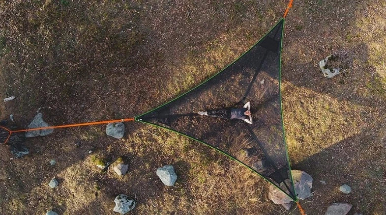Spacious 3-person outdoor hammock with unique 3-point anchor system for maximum comfort and stability