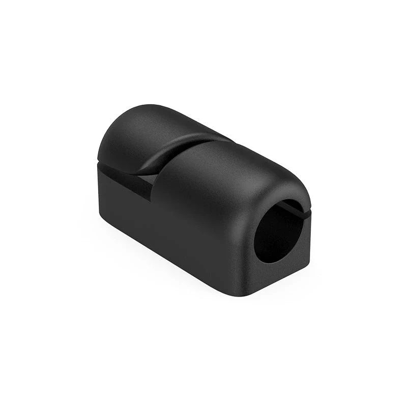 Premium silicone cable clips in various colours for organising and managing cables on desks, entertainment units, and other surfaces