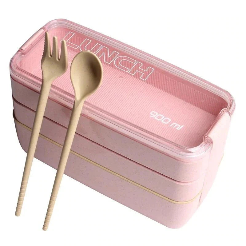 A stylish microwave-safe lunch box with a removable soup mug in various colours, including pink, green, and apricot
