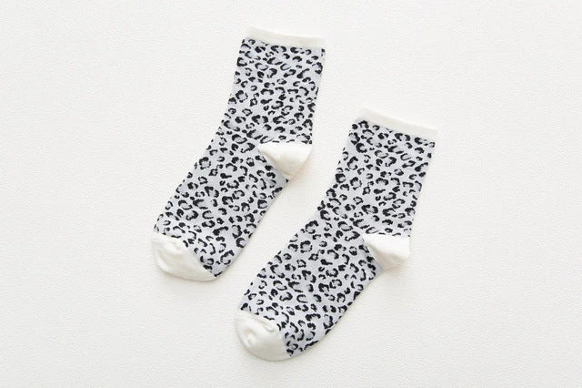 Stylish Dalmatian-inspired cotton crew socks with a premium blend of polyester, spandex, and cotton for all-day comfort and flexibility.