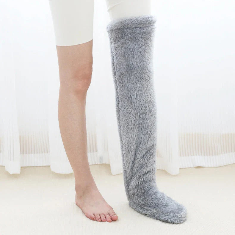 Cozy over-the-knee fuzzy socks in various colors, including brown, blue, dark gray, and pink purple