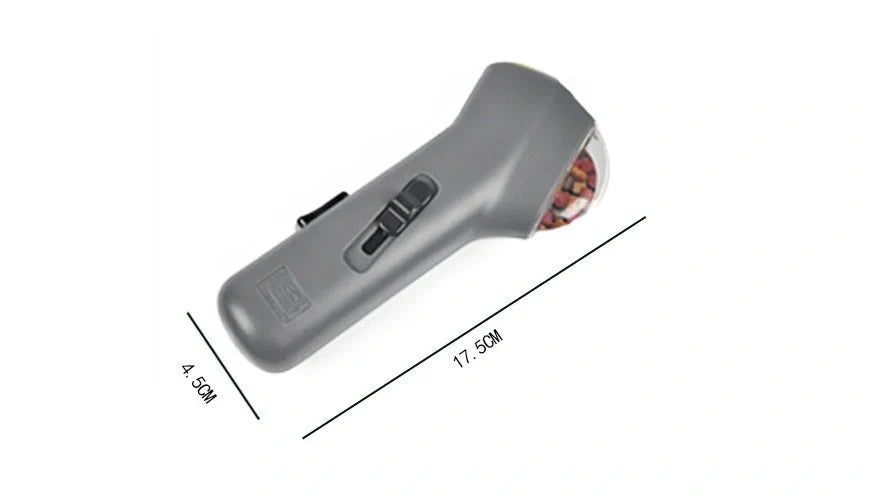 Dog Training Snack Launcher in grey, compact design for interactive pet play