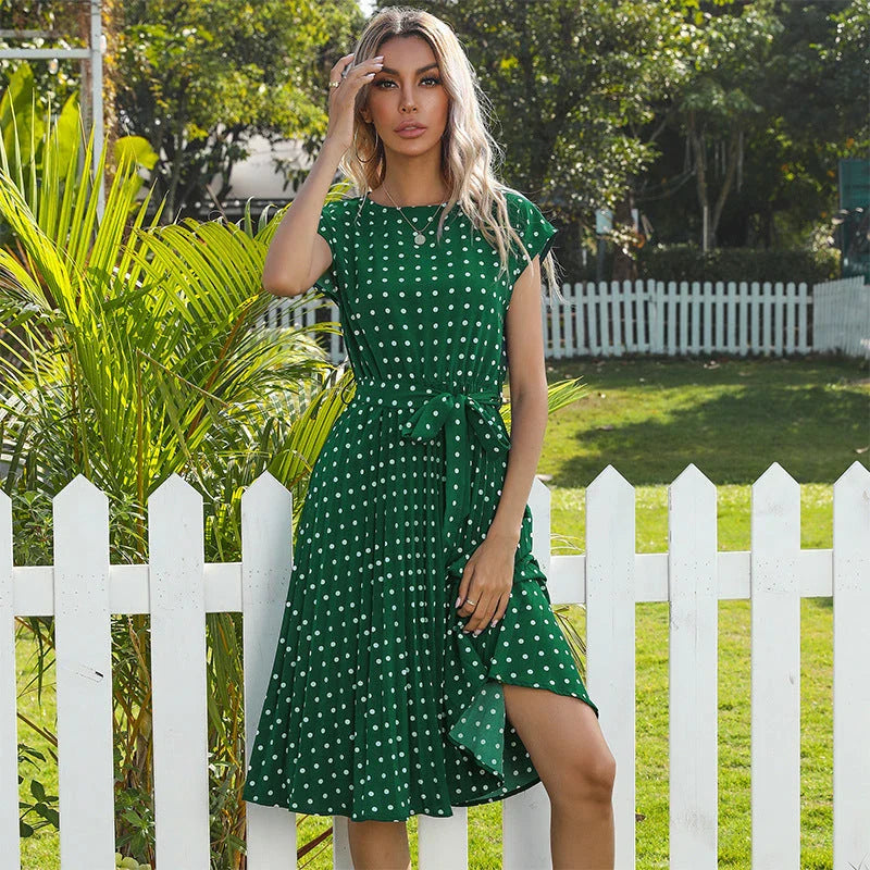 Stylish polka dot midi dress with short sleeves, pleated skirt, and hidden lining for a smooth, non-see-through fit