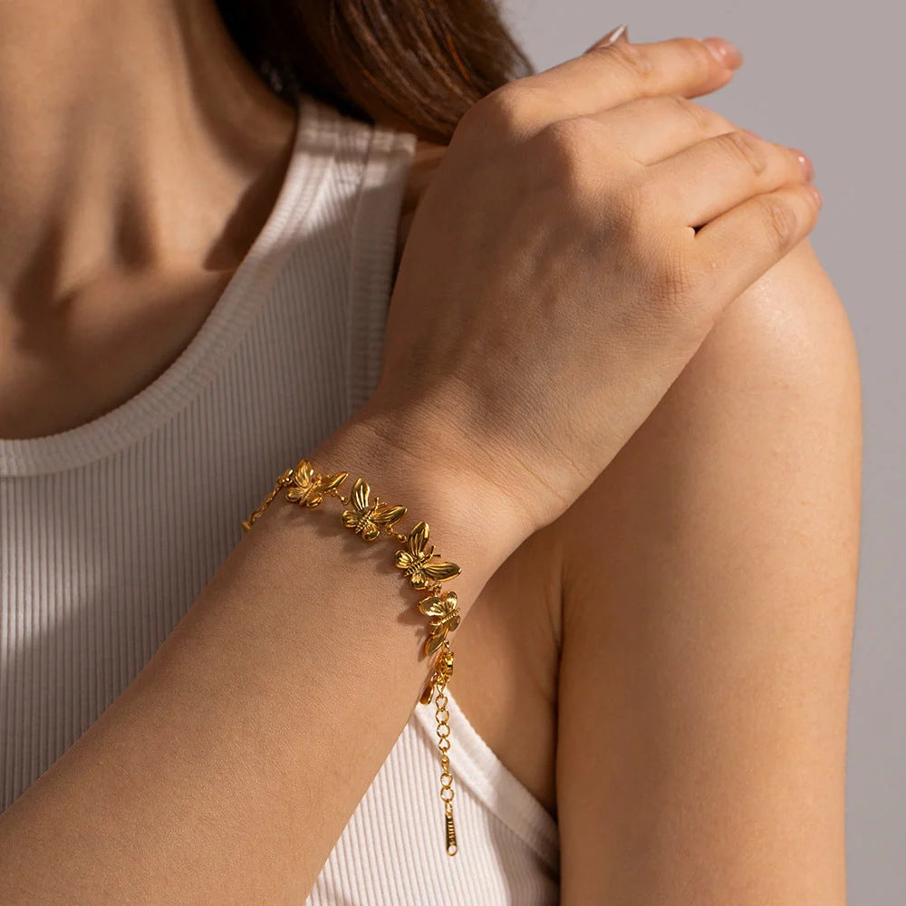 Elegant stainless steel butterfly bracelet with delicate design, available in various colours for UK women's fashion accessories