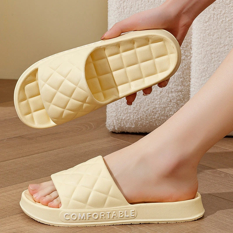 Cozy plaid indoor slippers with soft, silent, and waterproof EVA construction for comfortable all-day wear