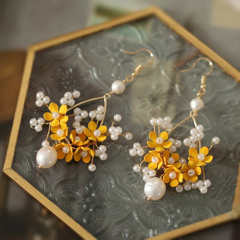 Retro Advanced Atmospheric Flower Earrings in White, Black, and Gold Colours
