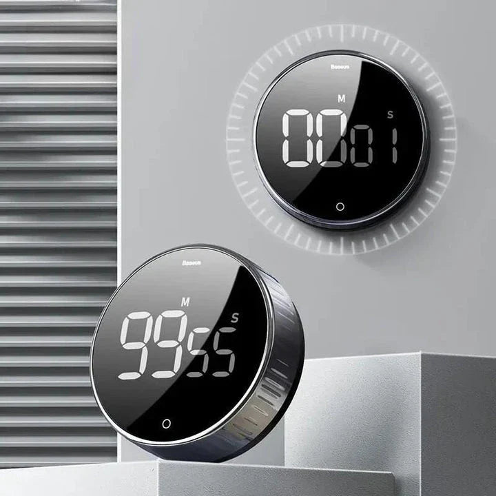 A multi-function magnetic kitchen timer with a digital countdown and LED display, perfect for cooking, exercising, and time management.