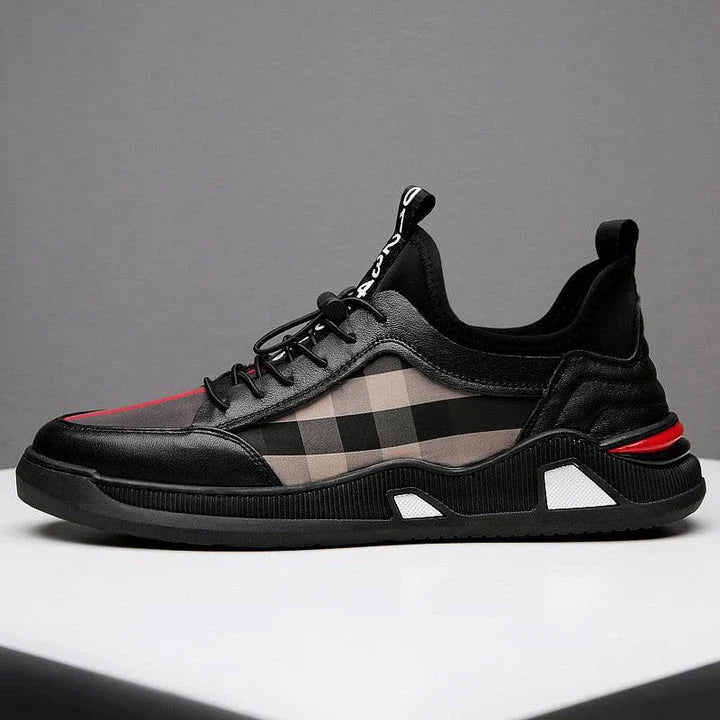 A pair of men's casual leather shoes with a sleek, lace-up design and a stylish check pattern.