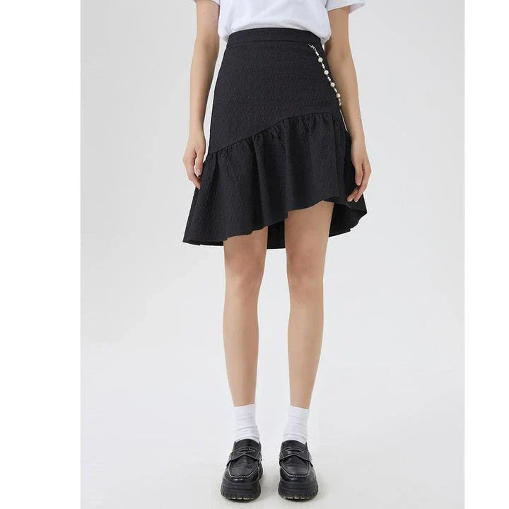 Metersbowne Jacquard Swallowtail Half Skirt Shorts in Black, featuring an embossed fabric design and a flattering silhouette for summer style.