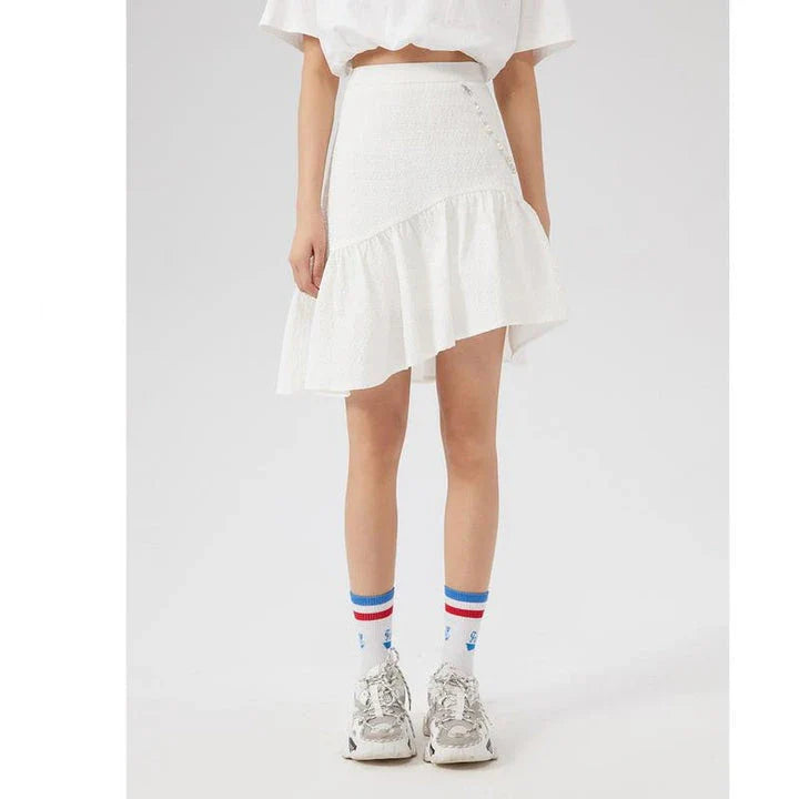 Metersbowne Jacquard Swallowtail Half Skirt Shorts in Black, featuring an embossed fabric design and a flattering silhouette for summer style.