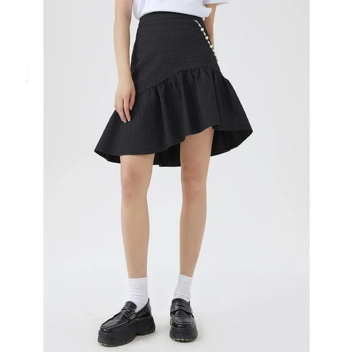 Metersbowne Jacquard Swallowtail Half Skirt Shorts in Black, featuring an embossed fabric design and a flattering silhouette for summer style.