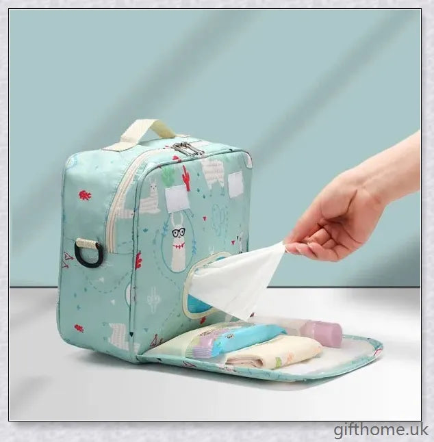 A versatile and stylish baby diaper bag with multiple compartments and soft handles for hands-free carrying.