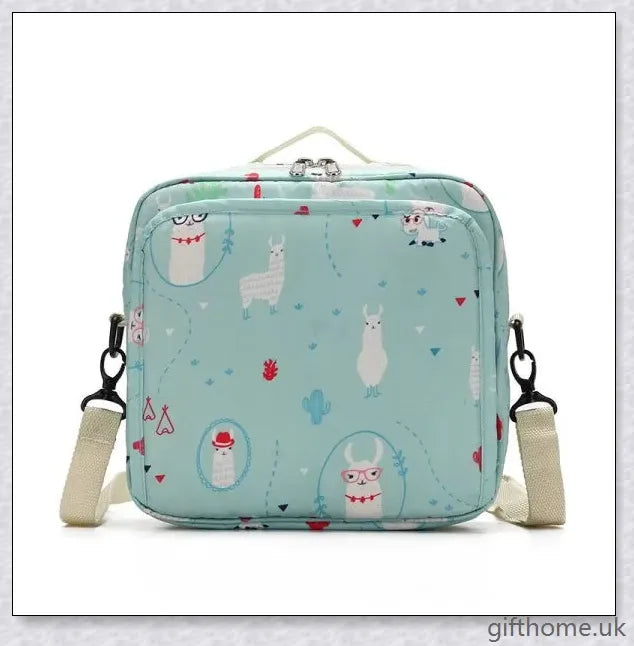 A versatile and stylish baby diaper bag with multiple compartments and soft handles for hands-free carrying.