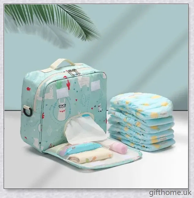 A versatile and stylish baby diaper bag with multiple compartments and soft handles for hands-free carrying.