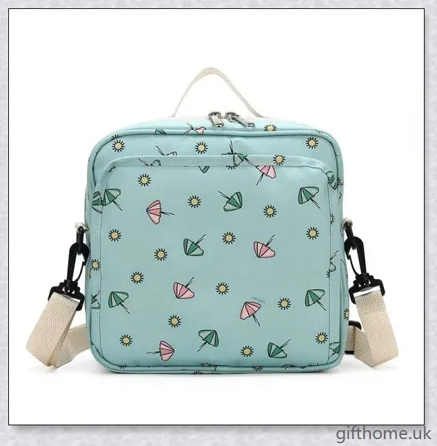 A versatile and stylish baby diaper bag with multiple compartments and soft handles for hands-free carrying.