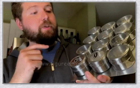 Magnetic spice jars with stainless steel canisters, BPA-free lids, and a magnetic rack for easy storage and organization in the kitchen.