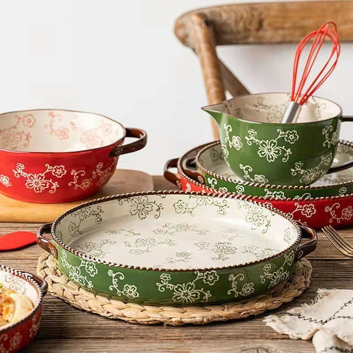Beautifully hand-painted ceramic baking sheet with a charming cherry blossom design, perfect for even baking and elegant serving.
