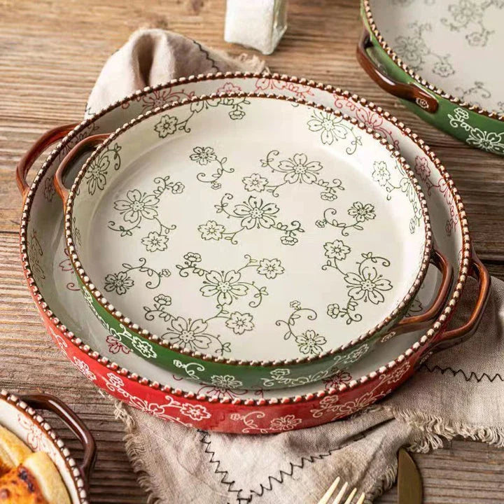 Beautifully hand-painted ceramic baking sheet with a charming cherry blossom design, perfect for even baking and elegant serving.
