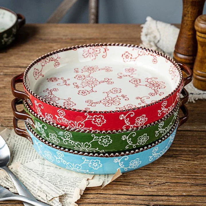 Beautifully hand-painted ceramic baking sheet with a charming cherry blossom design, perfect for even baking and elegant serving.
