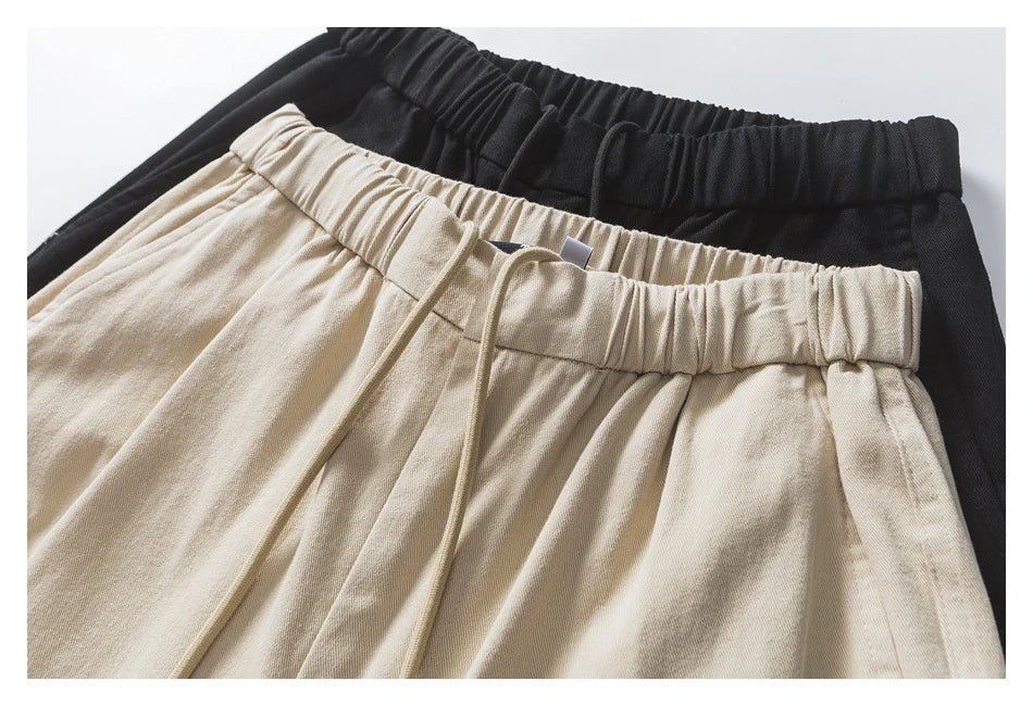 Stylish men's drawstring baggy straight trousers in black and milky white colours