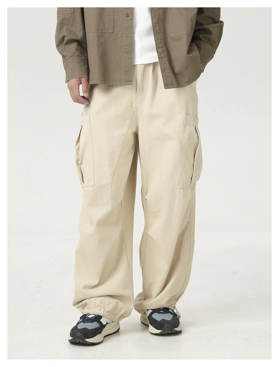Stylish men's drawstring baggy straight trousers in black and milky white colours