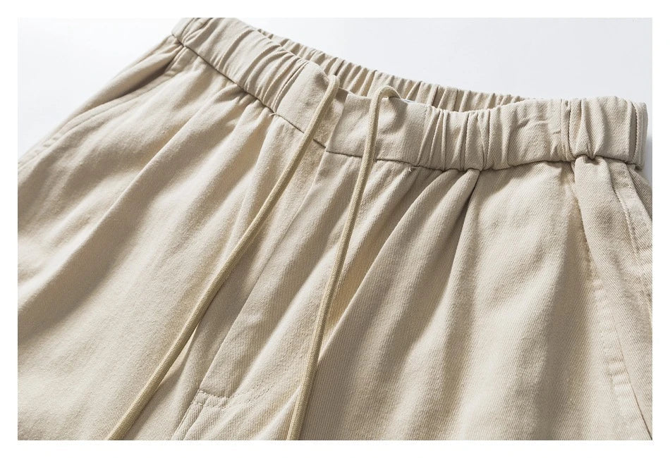 Stylish men's drawstring baggy straight trousers in black and milky white colours