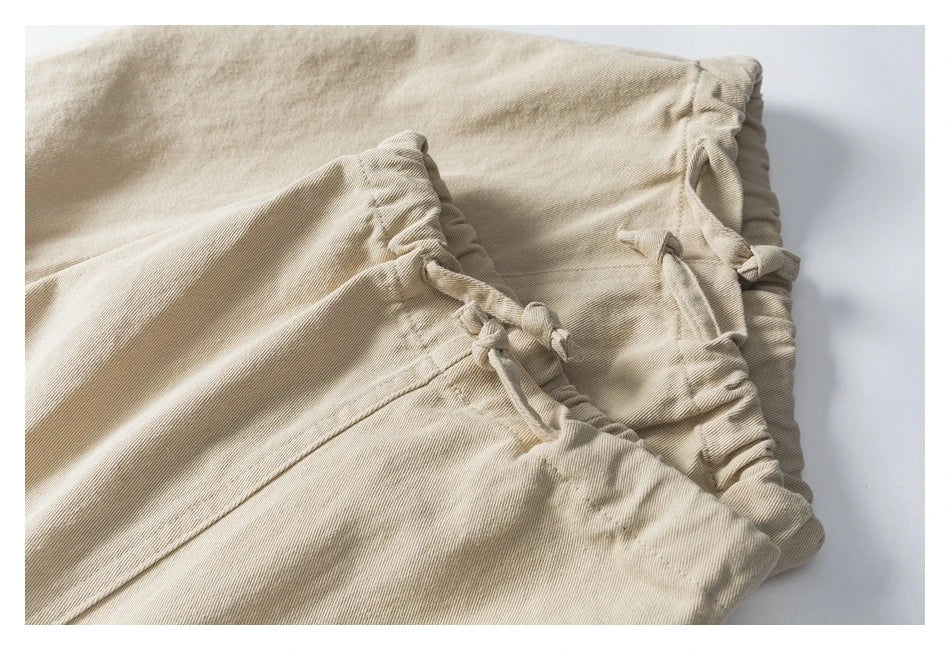 Stylish men's drawstring baggy straight trousers in black and milky white colours