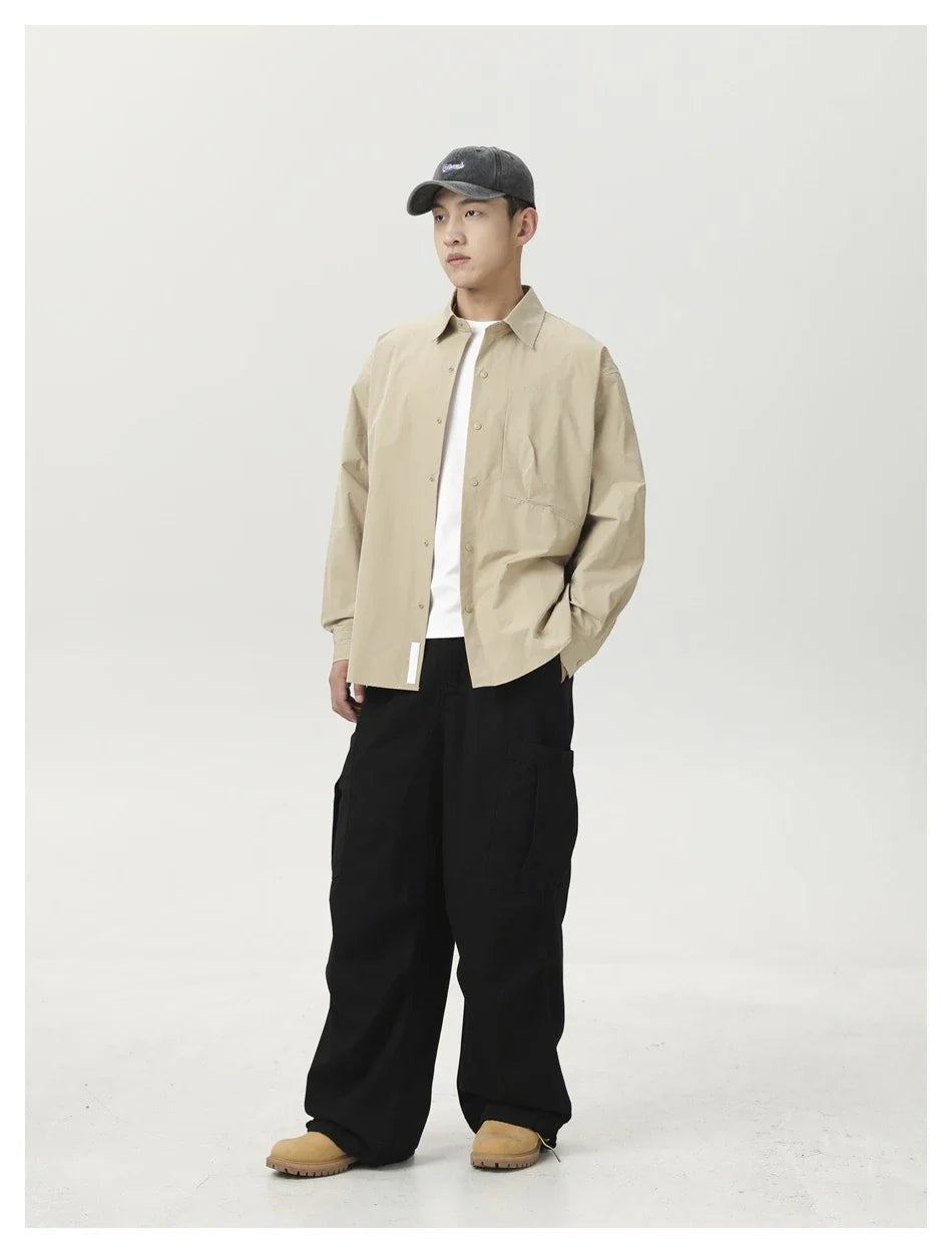 Stylish men's drawstring baggy straight trousers in black and milky white colours