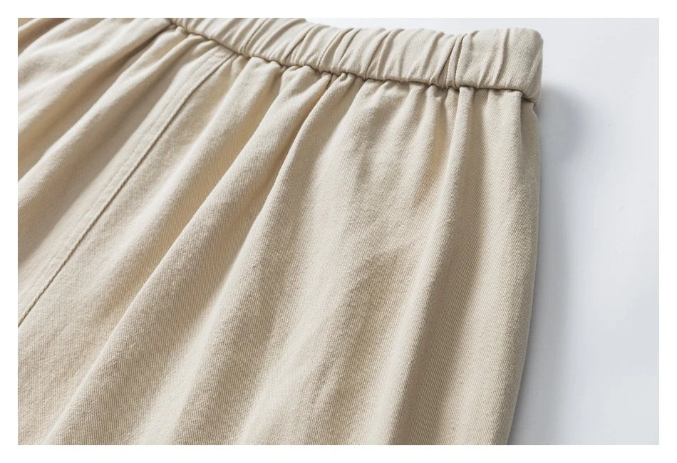 Stylish men's drawstring baggy straight trousers in black and milky white colours
