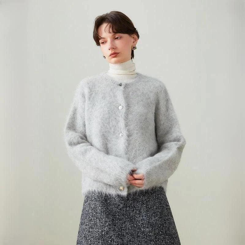 A stylish and cosy alpaca blend cardigan with a sophisticated design, perfect for transitioning between casual and office wear.
