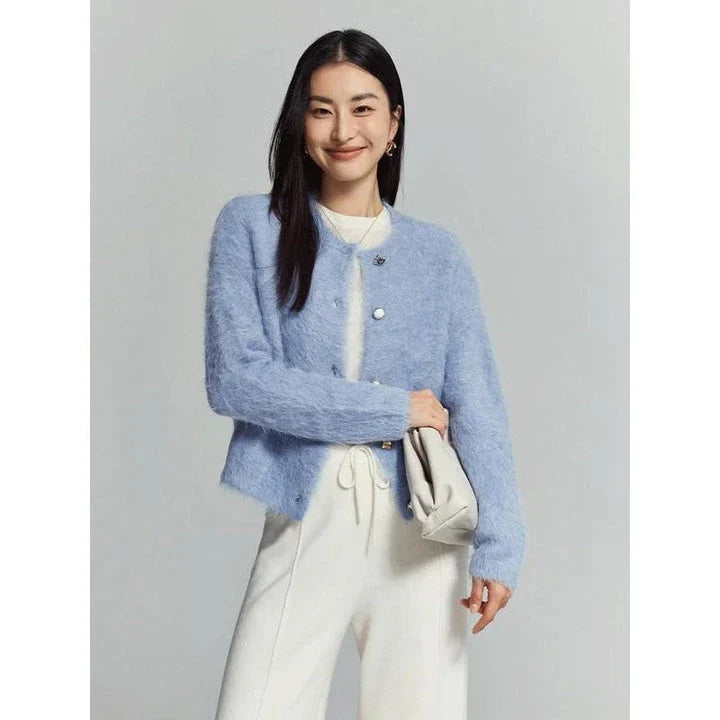 A stylish and cosy alpaca blend cardigan with a sophisticated design, perfect for transitioning between casual and office wear.