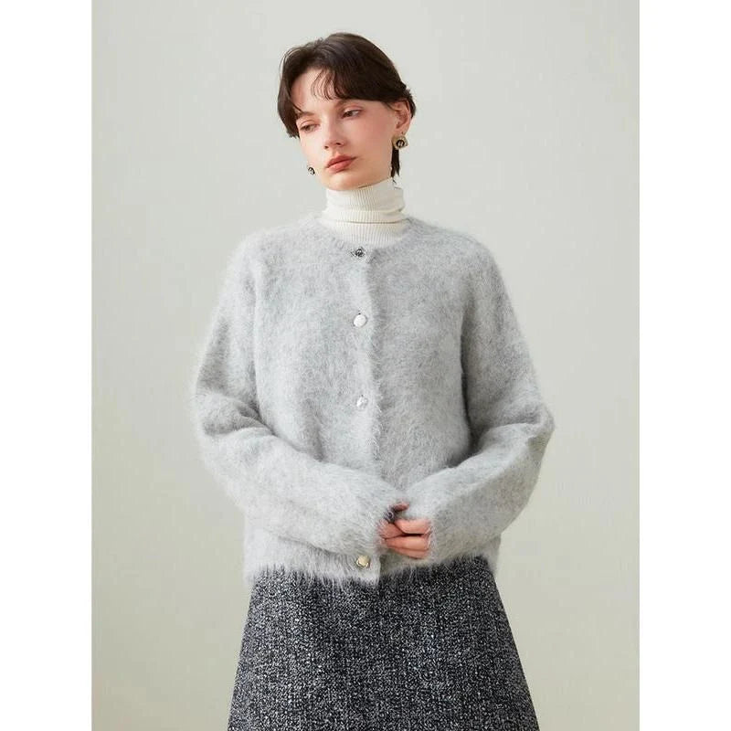 A stylish and cosy alpaca blend cardigan with a sophisticated design, perfect for transitioning between casual and office wear.