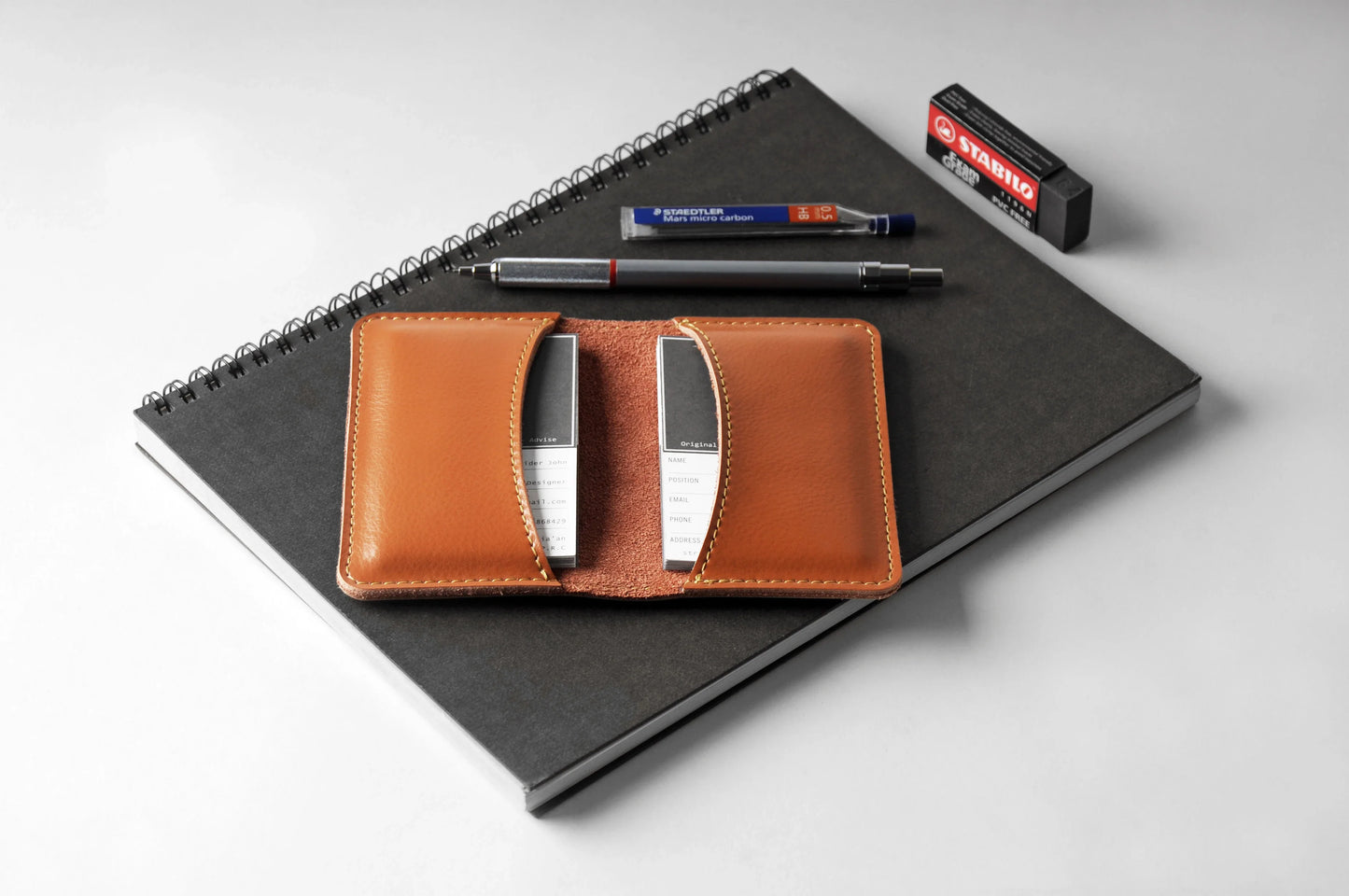 Premium leather business card holder in various colours, designed for professional men and women