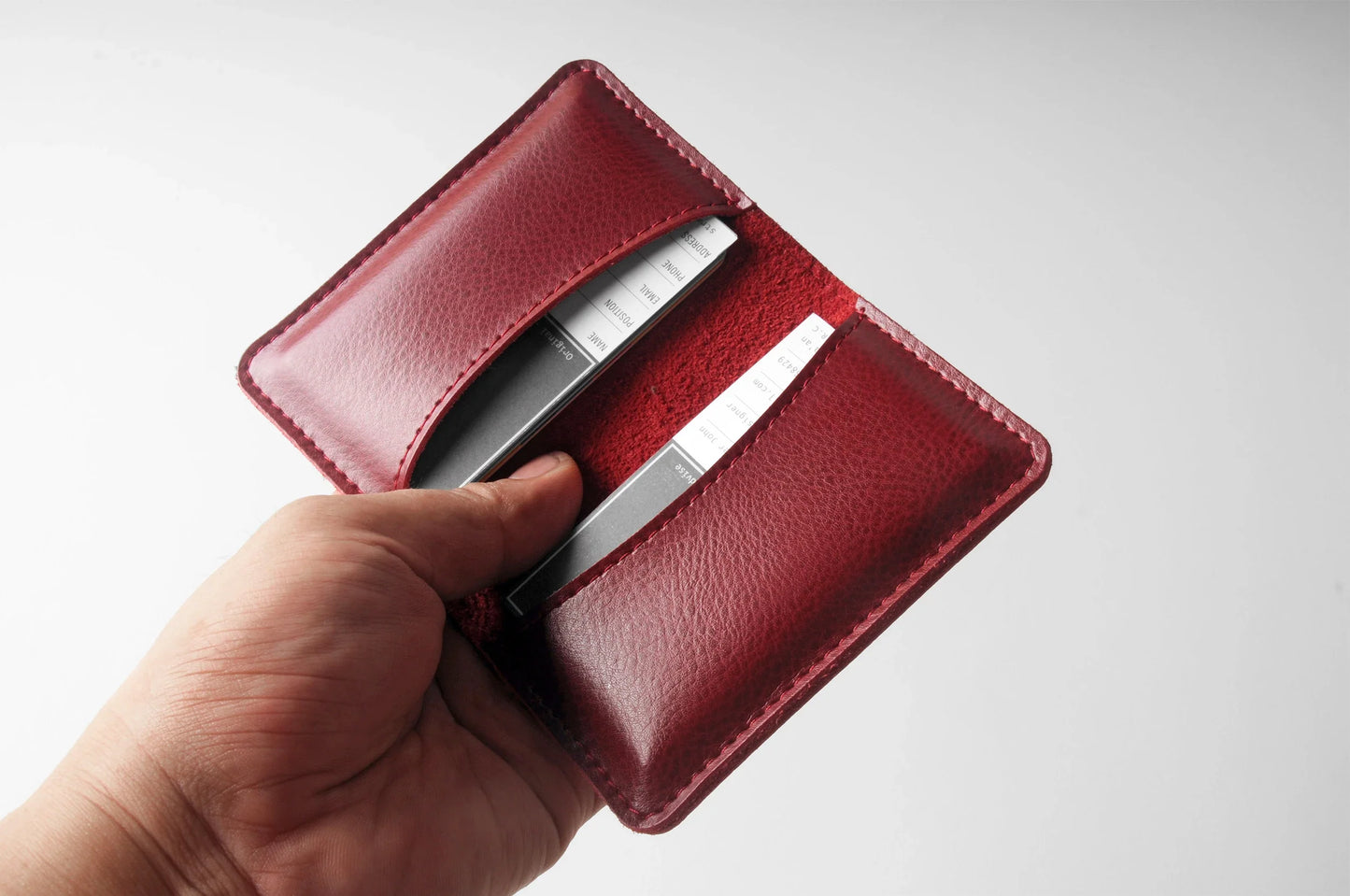 Premium leather business card holder in various colours, designed for professional men and women