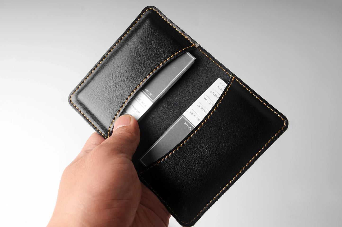 Premium leather business card holder in various colours, designed for professional men and women